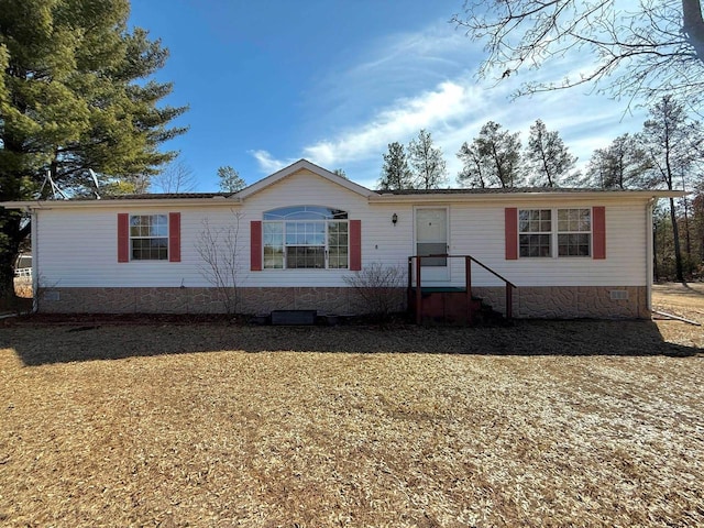 view of front of home featuring crawl space