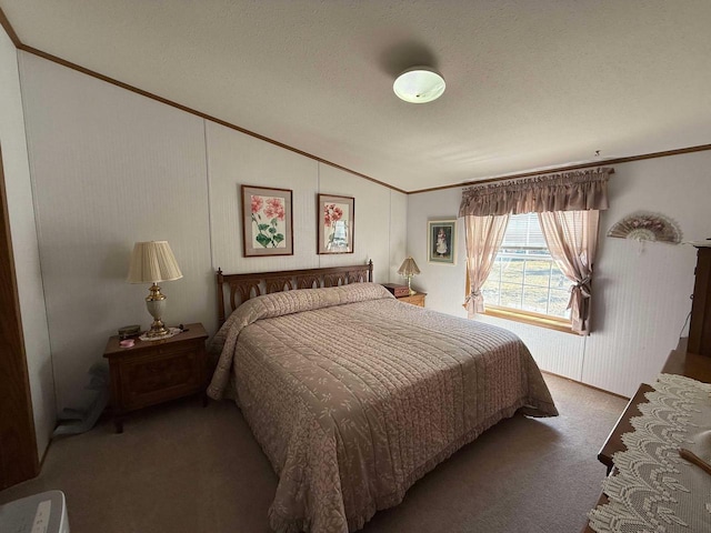 bedroom with lofted ceiling, carpet, and ornamental molding