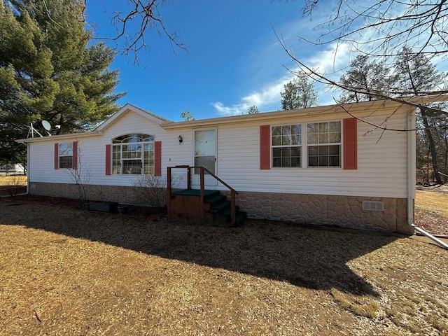 view of front of house featuring crawl space