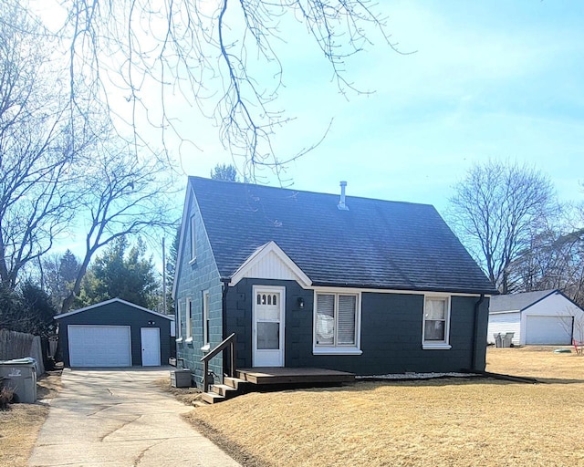 view of front facade featuring central AC, roof with shingles, an outdoor structure, a front yard, and a garage