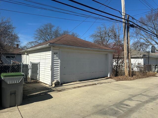 detached garage with fence