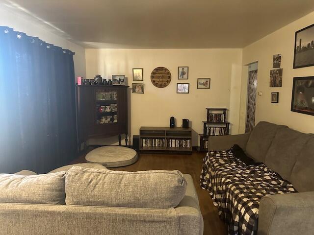 living area with wood finished floors