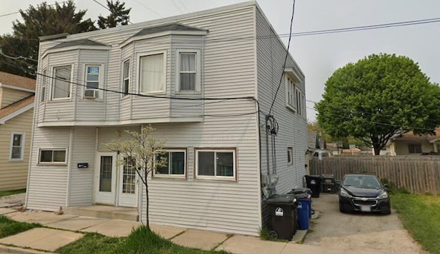 view of front of home with fence