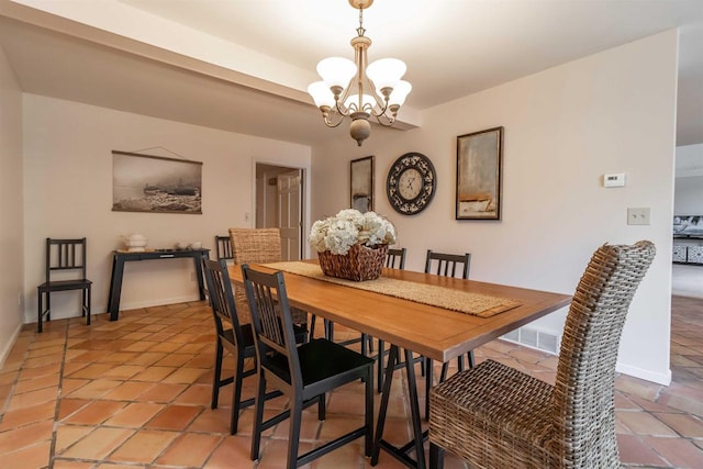 dining area with visible vents, baseboards, a chandelier, and light tile patterned flooring