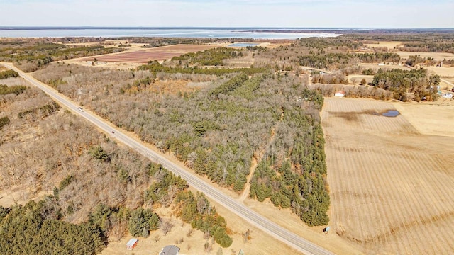 bird's eye view with a water view and a rural view