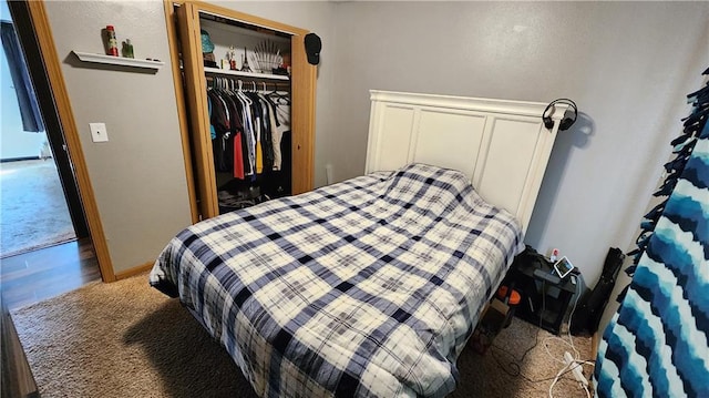 carpeted bedroom with a closet