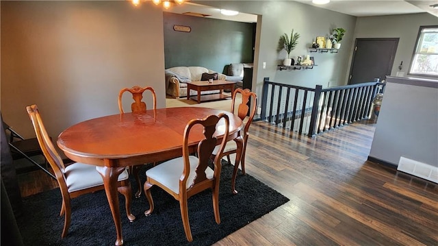 dining space featuring wood finished floors and visible vents