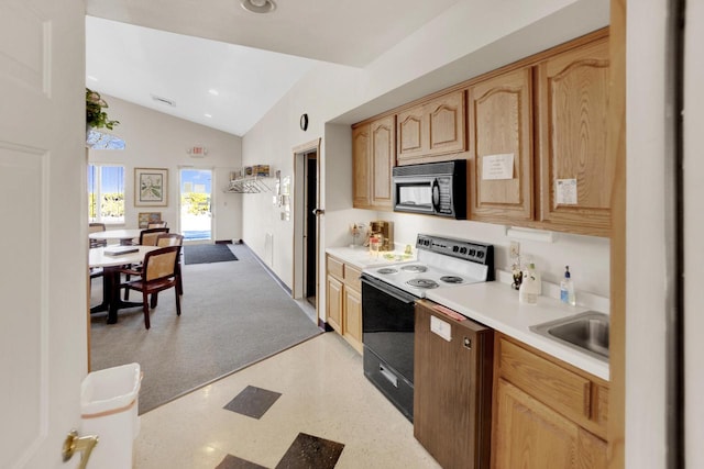 kitchen with light brown cabinets, lofted ceiling, electric range, a sink, and black microwave