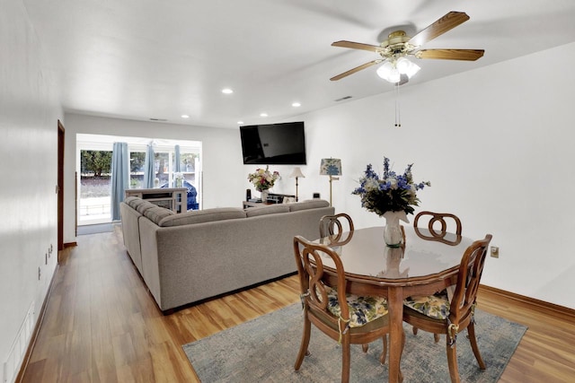 dining area featuring recessed lighting, baseboards, a ceiling fan, and light wood finished floors