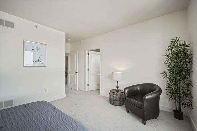 bedroom with visible vents, baseboards, and carpet