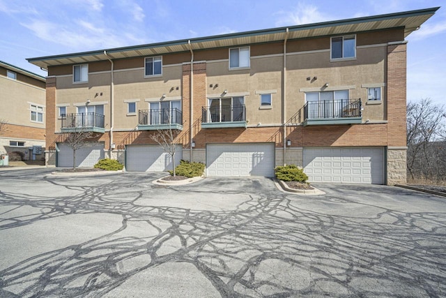 view of property featuring an attached garage