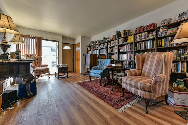 sitting room featuring wood finished floors