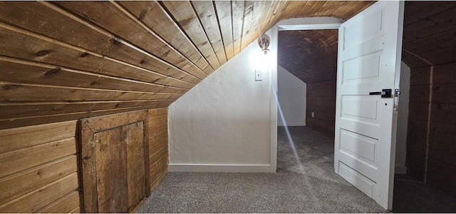 additional living space with carpet flooring, wood walls, wood ceiling, and lofted ceiling