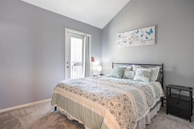 bedroom with vaulted ceiling, carpet, and baseboards