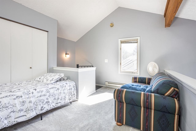 bedroom featuring a baseboard heating unit, carpet, a closet, and vaulted ceiling with beams