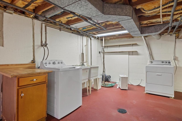 laundry room featuring laundry area and washer and clothes dryer