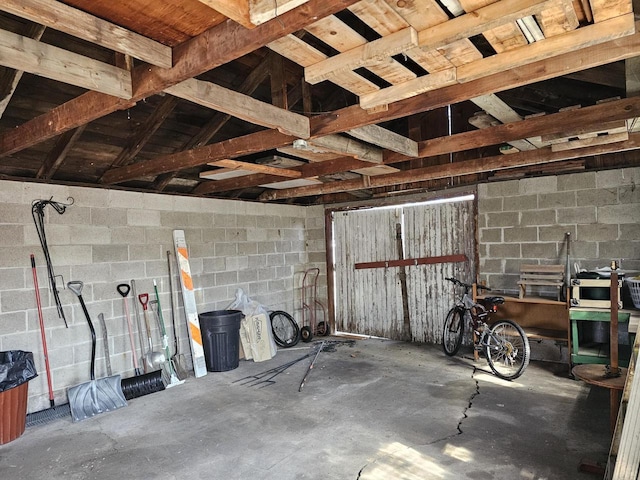 garage featuring concrete block wall