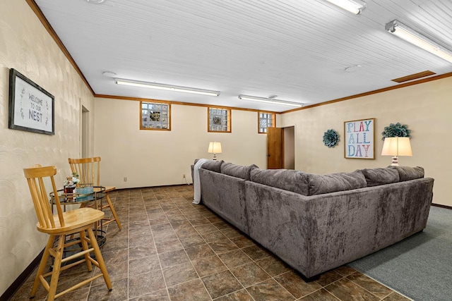 living room with baseboards and ornamental molding