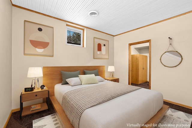 bedroom with visible vents, baseboards, wooden ceiling, and crown molding