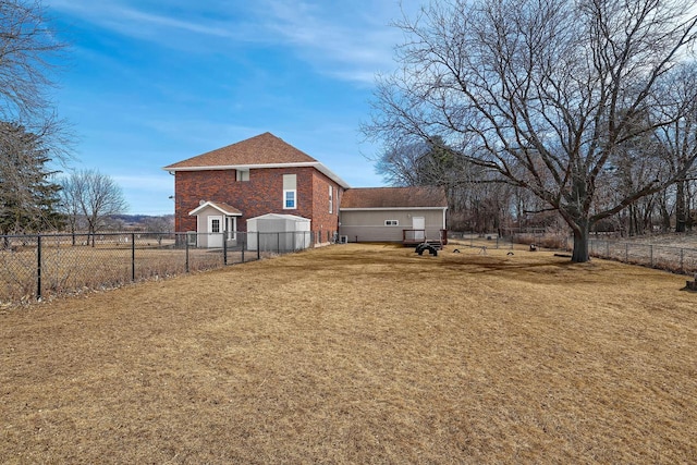 view of yard with a fenced backyard