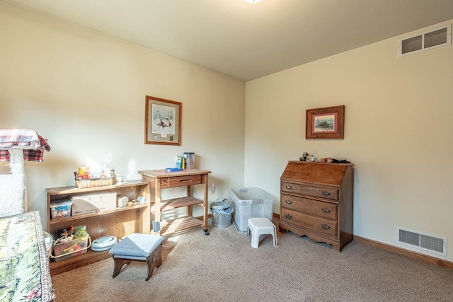 living area featuring carpet flooring, baseboards, and visible vents