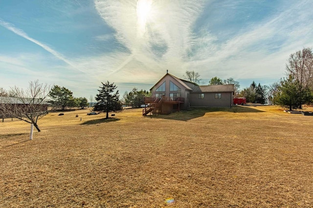 view of yard with a wooden deck