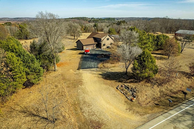 birds eye view of property with a rural view