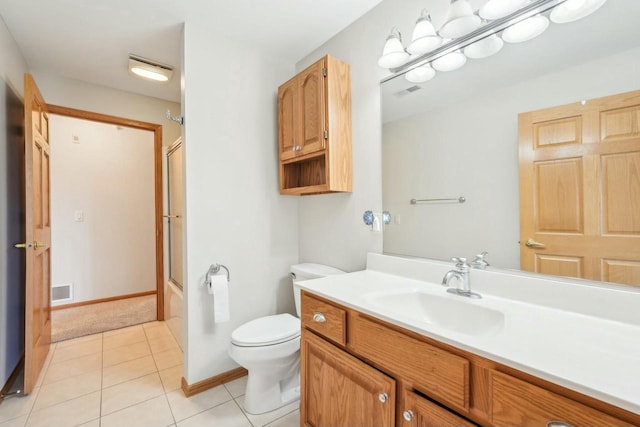 bathroom with vanity, visible vents, bath / shower combo with glass door, tile patterned flooring, and toilet