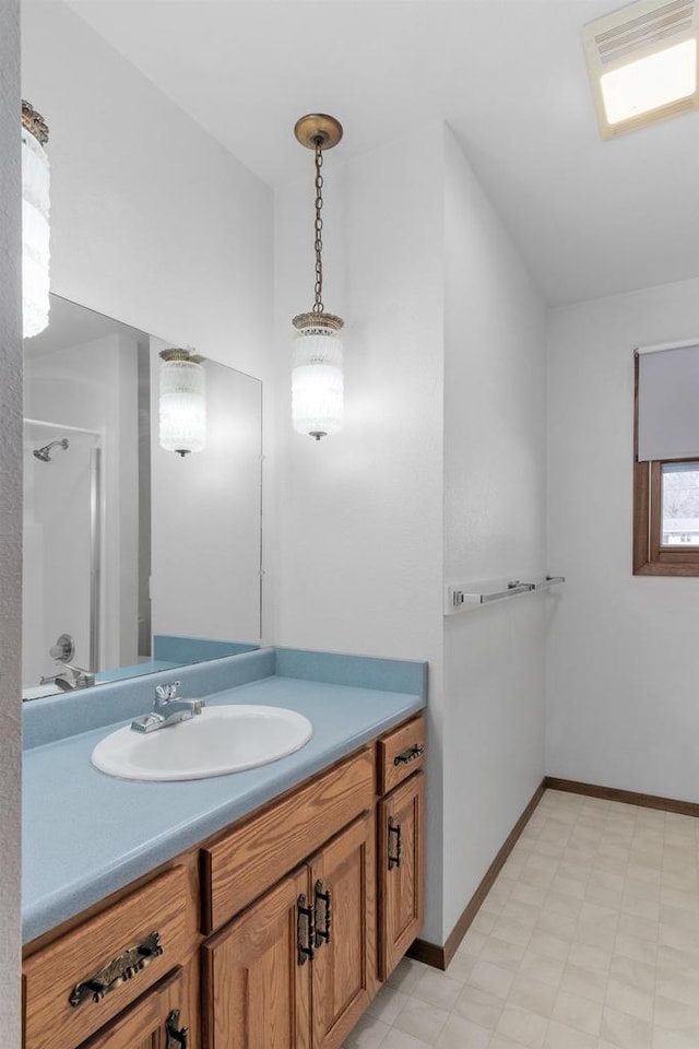 full bathroom with visible vents, baseboards, tile patterned floors, vanity, and a shower