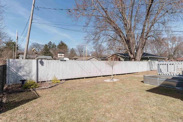 view of yard with fence