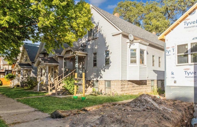 view of home's exterior featuring a shingled roof