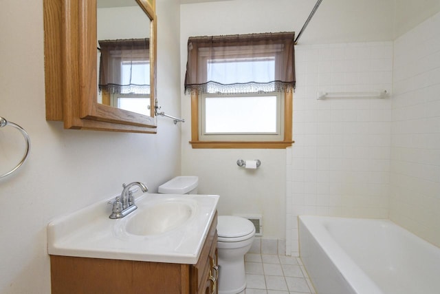 full bath featuring vanity, washtub / shower combination, visible vents, tile patterned flooring, and toilet