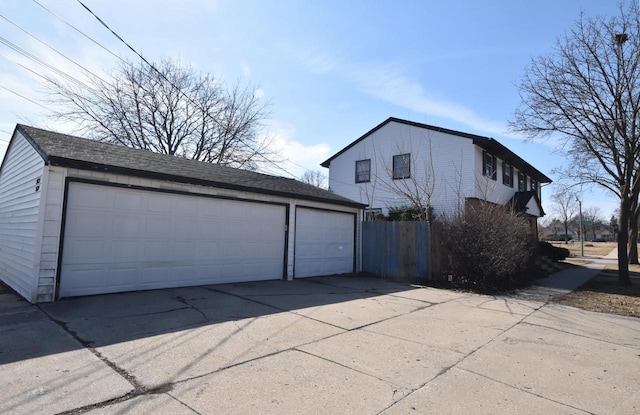 detached garage with fence