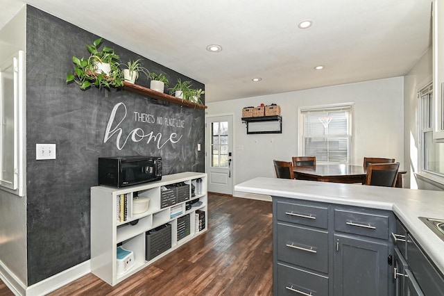 kitchen with open shelves, recessed lighting, gray cabinetry, dark wood-type flooring, and light countertops