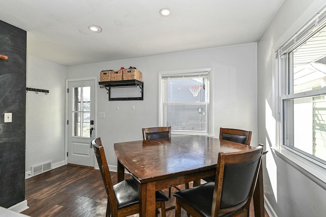 dining area featuring dark wood-type flooring, recessed lighting, baseboards, and visible vents