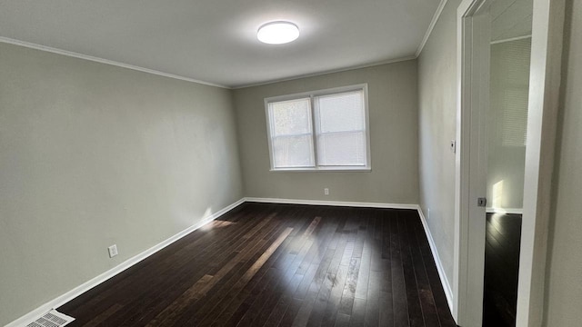 unfurnished bedroom with crown molding, baseboards, dark wood-style flooring, and visible vents