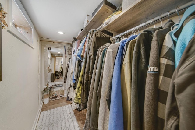 spacious closet with wood finished floors