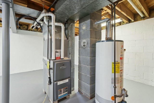 utility room featuring water heater