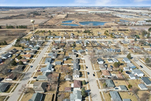 aerial view featuring a residential view and a water view