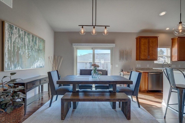 dining area featuring recessed lighting, visible vents, and light wood-type flooring