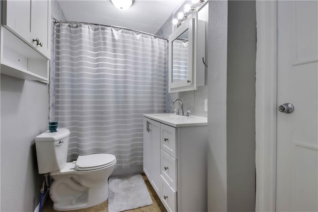 bathroom with a shower with shower curtain, toilet, and vanity