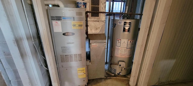 utility room with gas water heater and heating unit