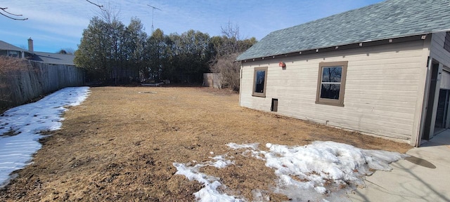 view of yard with fence