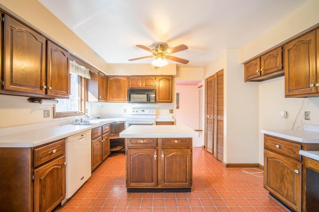 kitchen with range with electric stovetop, black microwave, light countertops, dishwasher, and ceiling fan