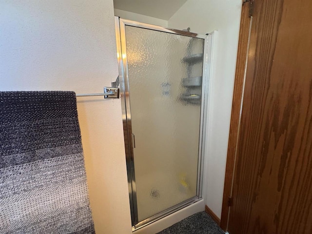 bathroom with a stall shower