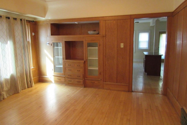 unfurnished bedroom featuring light wood-style floors