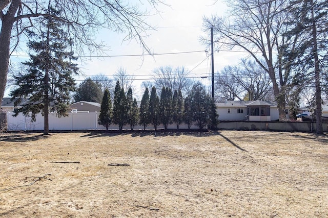 view of yard featuring fence