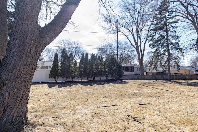 view of yard with fence