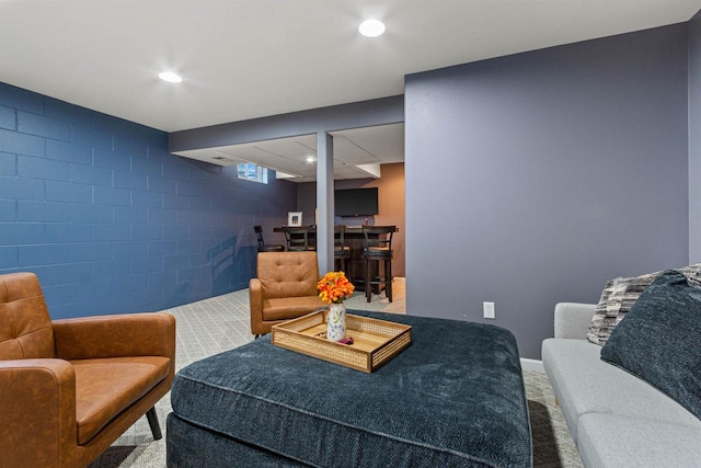 living room featuring recessed lighting and carpet floors