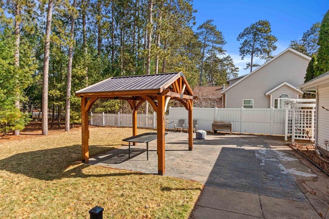 view of patio / terrace with a gazebo and fence